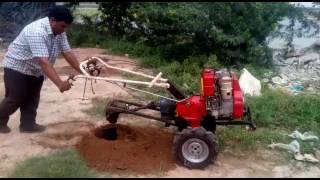 EARTH AUGER OPERATED BY HAND ROTARY TILLER [upl. by Inafit714]