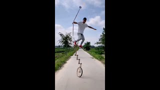 Incredible Chinese acrobat shows off skills on unicycle [upl. by Damara]