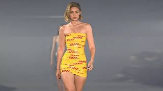 Gigi Hadid Stumbles in Skintight Duct Tape Dress on Vetements Runway Rebounds Like a Pro [upl. by Gredel]