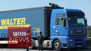 Calais Migrant climbs into lorry 360 video  BBC News [upl. by Sonnie]