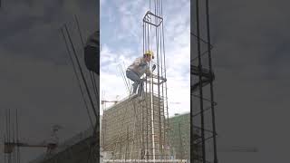 Female worker installation process of steel bar cover at construction site [upl. by Rebak464]