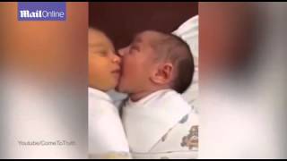 Is this is most adorable video ever Hungry newborn who is crying for a feed sucks on another baby [upl. by Aurelea438]