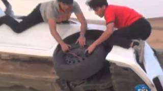 Arabian stunt drivers change tyres in the air [upl. by Nyleahcim570]