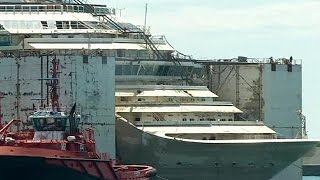 Costa Concordia wreck docks in Genoa [upl. by Hbahsur]