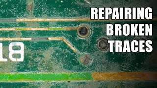 Repairing broken traces on a circuit board [upl. by Ayoras]