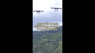 Heavylift drones deliver large payloads to mountain top in SW China [upl. by Stacia911]