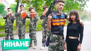 Hihahe Nerf War Couple Police Nerf guns Fight Criminal Group Rescue Teammate [upl. by Tonina565]