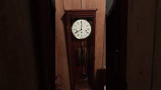 Howard Miller Wall Clock chiming the hour [upl. by Irrak]