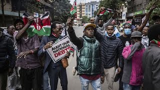 Pro and antigovernment protesters clash in Kenya as police hurl teargas cannisters [upl. by Ikcir899]