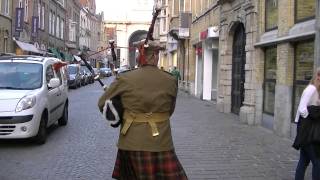 Marching with the Bagpipes toward the Menin Gate Ypres [upl. by Aillicec]