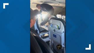 Passenger restrained with zip ties on United Airlines flight after bizarre outburst [upl. by Siryt571]