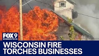 Centuryold building burns in Rice Lake Wisconsin leaving business owners displaced [upl. by Rumney412]