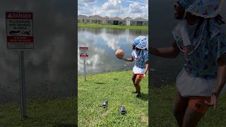 Grown Baby kicks basketball in alligator Lake 😳😂 shorts [upl. by Akinehs]