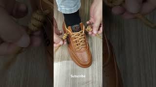 How to tie the laces of sports shoes youtubeshorts [upl. by Bibbye34]