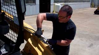 How to Release Auxiliary Hydraulic Pressure on a Cat 256C Skid Steer Loader [upl. by Notxarb]