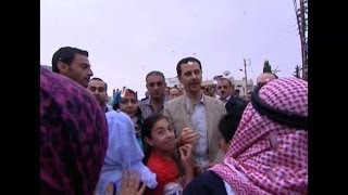 Syrias Assad pays Easter visit to old Christian town [upl. by Larue198]