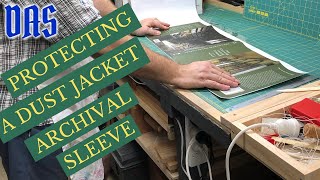 Protecting a Dust Jacket with an Archival Polyester Sleeve  Adventures in Bookbinding [upl. by Loginov336]