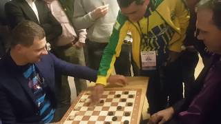 2017 World Championship Draughts64 Marcelo of Brazil showing Intl Grandmasters some shots [upl. by Wane350]