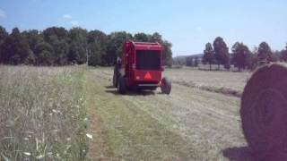 MasseyHesston MF1745 Baler in field [upl. by Aitnyc]