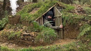 Building complete and warm survival shelter  Bushcraft earth hut grass roof amp fireplace with clay [upl. by Boehike496]