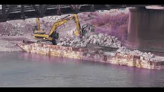 2 yellow excavators digging up big rocksexcavators barge [upl. by Scheers]