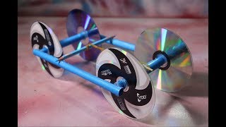 Make Rubber Band Powered Car With Recycle CD Disc  Unique Project [upl. by Muna]