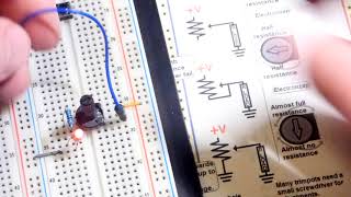 Trimpot trimmer potentiometer variable resistor voltage divider electronics component explained [upl. by Ahsemak120]