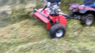 QUADX flail mower in action in WET RUSHES [upl. by Barnaby269]