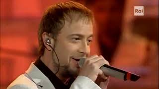 Marco Masini  Luomo volante SANREMO 2004 [upl. by Bomke133]