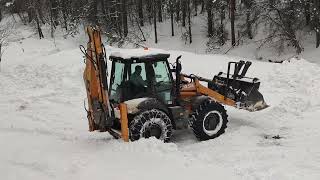 Plowing snow with CASE 580N loader [upl. by Mamoun]