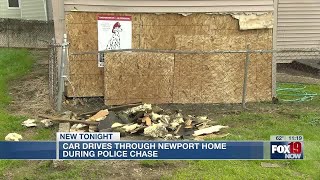 Car drives through Newport home during police chase [upl. by Akyre]