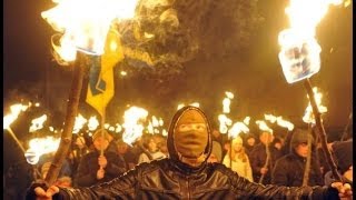 TORCHLIT MARCH IN KIEV BY UKRAINES RIGHTWING SVOBODA PARTY  BBC NEWS [upl. by Marji976]