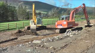 Hitachi and New Holland Kobelco excavators [upl. by Rahm112]