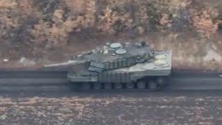 Ukrainian Leopard tank destroys Russian BTR Armored vehicle in the Donetsk region [upl. by Ellata645]