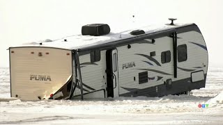 Five vehicles fall through the ice on Lake Winnipeg in one day [upl. by Einahpetse992]