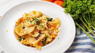 Easy BOW TIE PASTA WITH SPINACH AND TOMATOES Recipe  Recipesnet [upl. by Desdee]