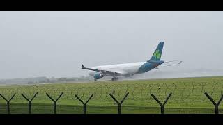 Plane spotting at Manchester airport during heavy rain [upl. by Yrtnej]