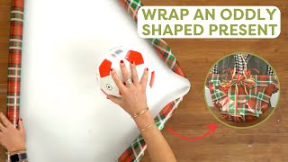 How To Wrap an Oddly Shaped Gift 🎁 🤔  HGTV Handmade [upl. by Yttam227]