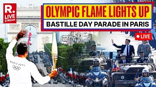 Olympic Flame Lights Up Paris Military Parade For Bastille Day In France  LIVE [upl. by Maxa]