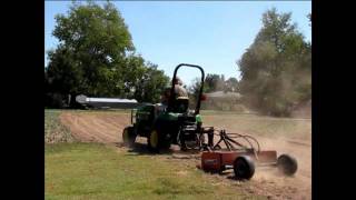 JD 2305 and 318 working with a land leveler [upl. by Sher]