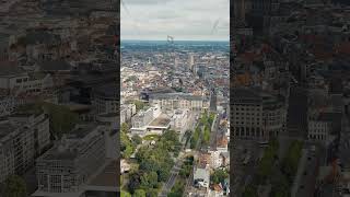 Vertical video Ghent Belgium Panorama of the central city from the air Cloudy weather summer [upl. by Acima]