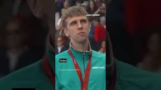 Neutral athletes from Russia listen to the Ukrainian anthem at an awards ceremony warinukraine [upl. by Nosnehpets]