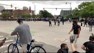 Protestors walking into Detroit riot police at end of “By All Means Necessary” march [upl. by Gilberta175]