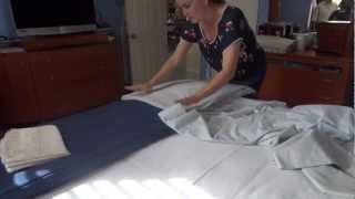 Folding and organizing bedding sheets [upl. by Alrats]