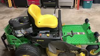 Installing headlights on a John Deere Z335E lawn tractor [upl. by Zaob]