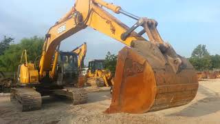 Operating a John Deere 225 Excavator [upl. by Avi]