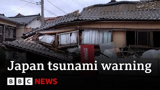 Japan downgrades major tsunami warning after earthquakes  BBC News [upl. by Shipman355]