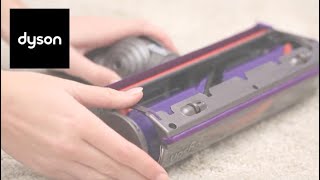 How to reset your Dyson Cyclone V10™ cordless vacuums cleaner head [upl. by Tillman]