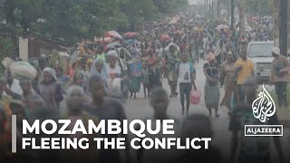 Mozambique fighting Tens of thousands flee renewed attacks [upl. by Nylarak]