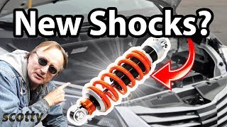 How to Check Shocks and Struts in Your Car [upl. by Refanej]